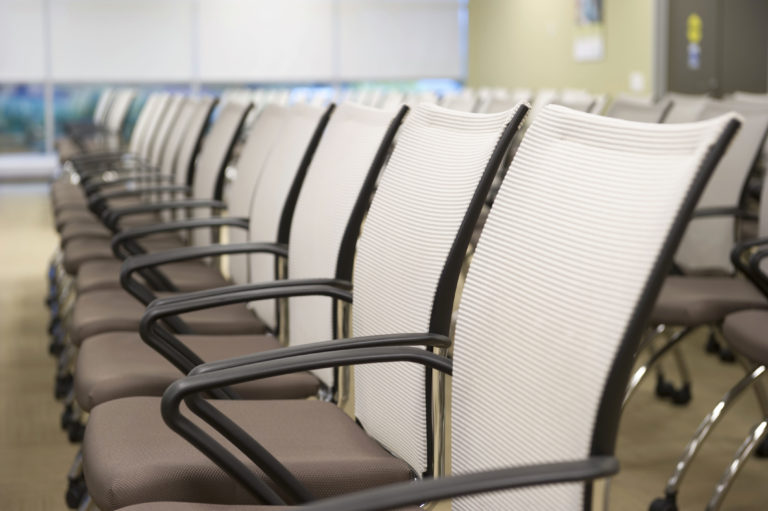 Image of the theatre setup in Conference room east, close-up on chairs