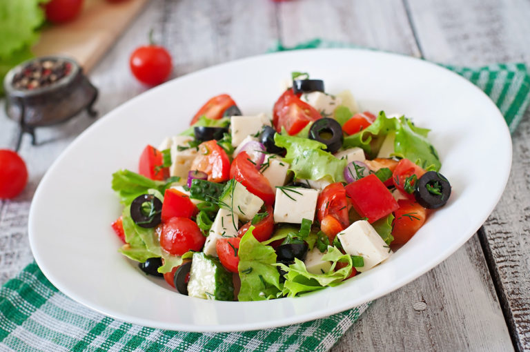 Image of greek salad with black olives and feta cheese
