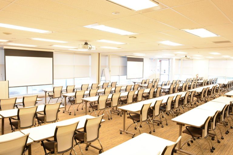A view from the back of the conference centre 1 east central in a classroom configuration