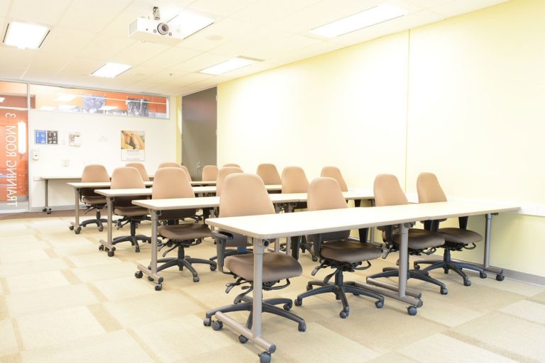 A view of training room 3 set up in a classroom configuration